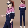 The 2020 new style of the Women's Spring and Autumn sports suit is fashionable and stylish. It features a long-sleeved sweatshirt, loose running wear and a casual two-piece set that is trendy Specification image
